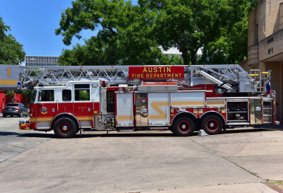 Fire truck standing in the driveway in front of the fire station
