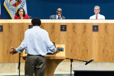Citizens of Austin, Texas attend and speak at a public hearing 